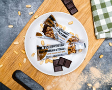 Lade das Bild in den Galerie-Viewer, #WEGAIN Dark Chocolate &amp; Peanut Low Sugar Nut Bar 40g - Tray a 12 Riegel
